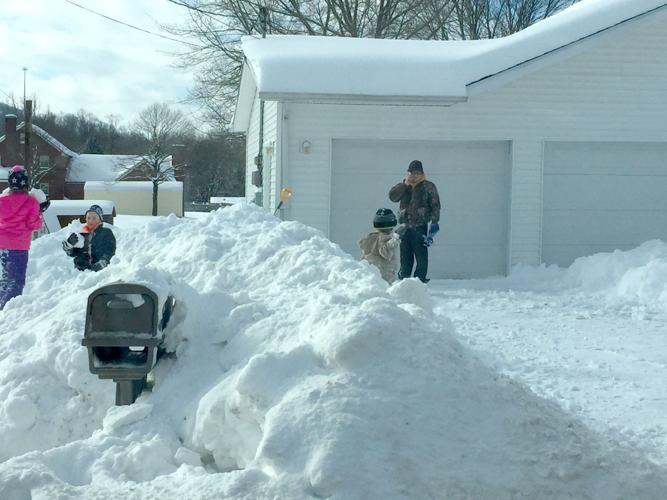 Massive cleanup underway as residents dig out of snow storm | Local ...