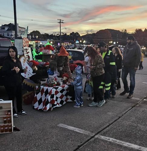 Hand Sataf Vendors hand out candy | | wvnews.com