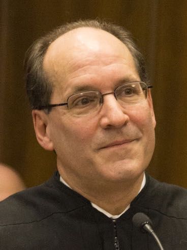 U.S. Magistrate Judge Michael Aloi