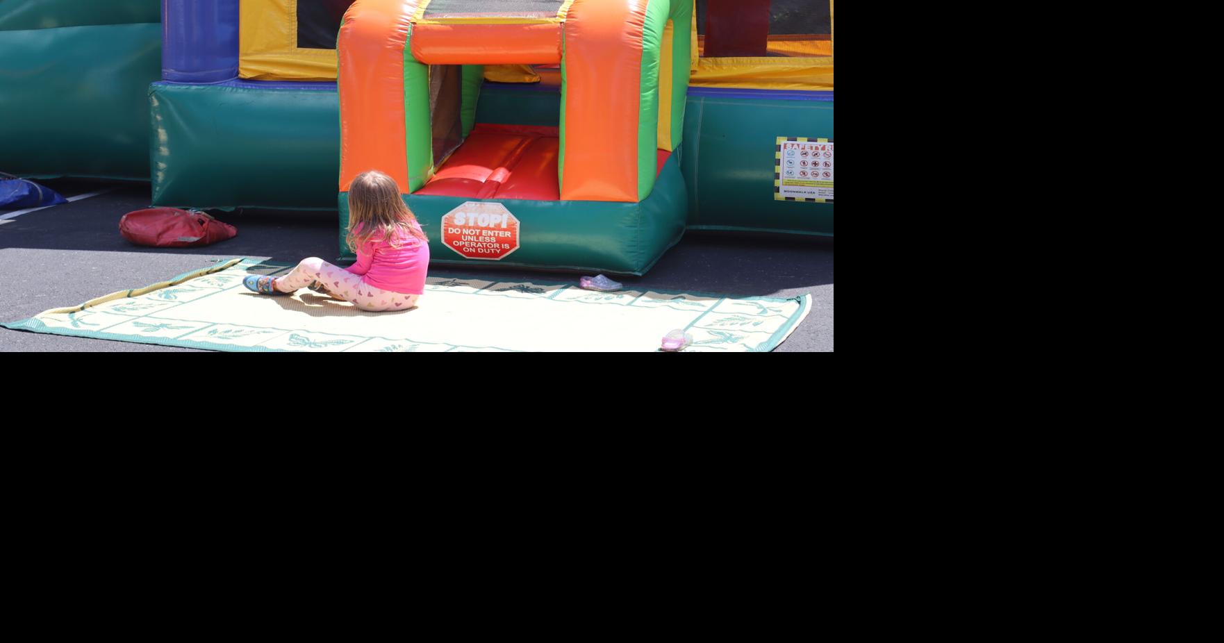 Kid at a bounce house