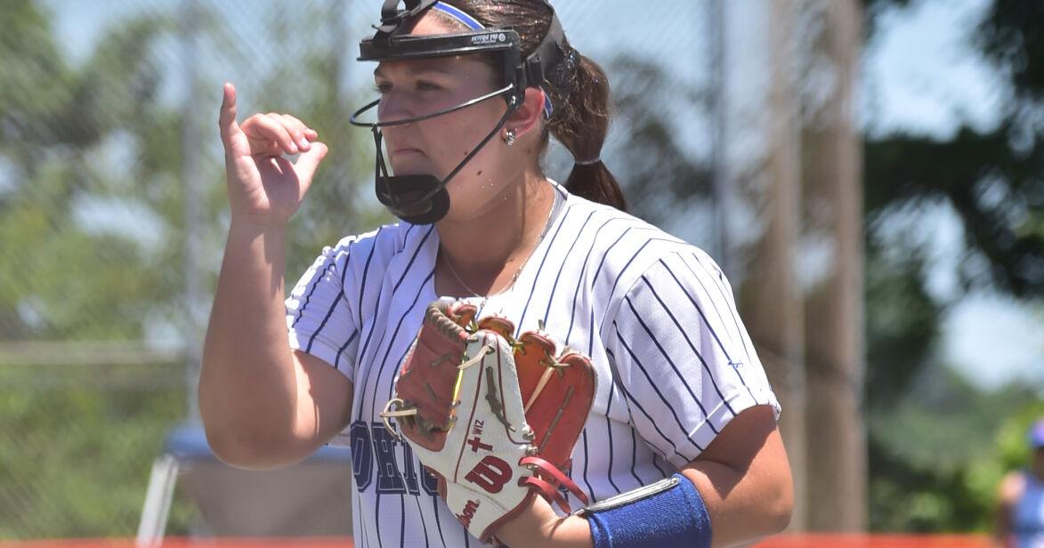 Maddie Wisman clears the pitch call with her catcher.JPG