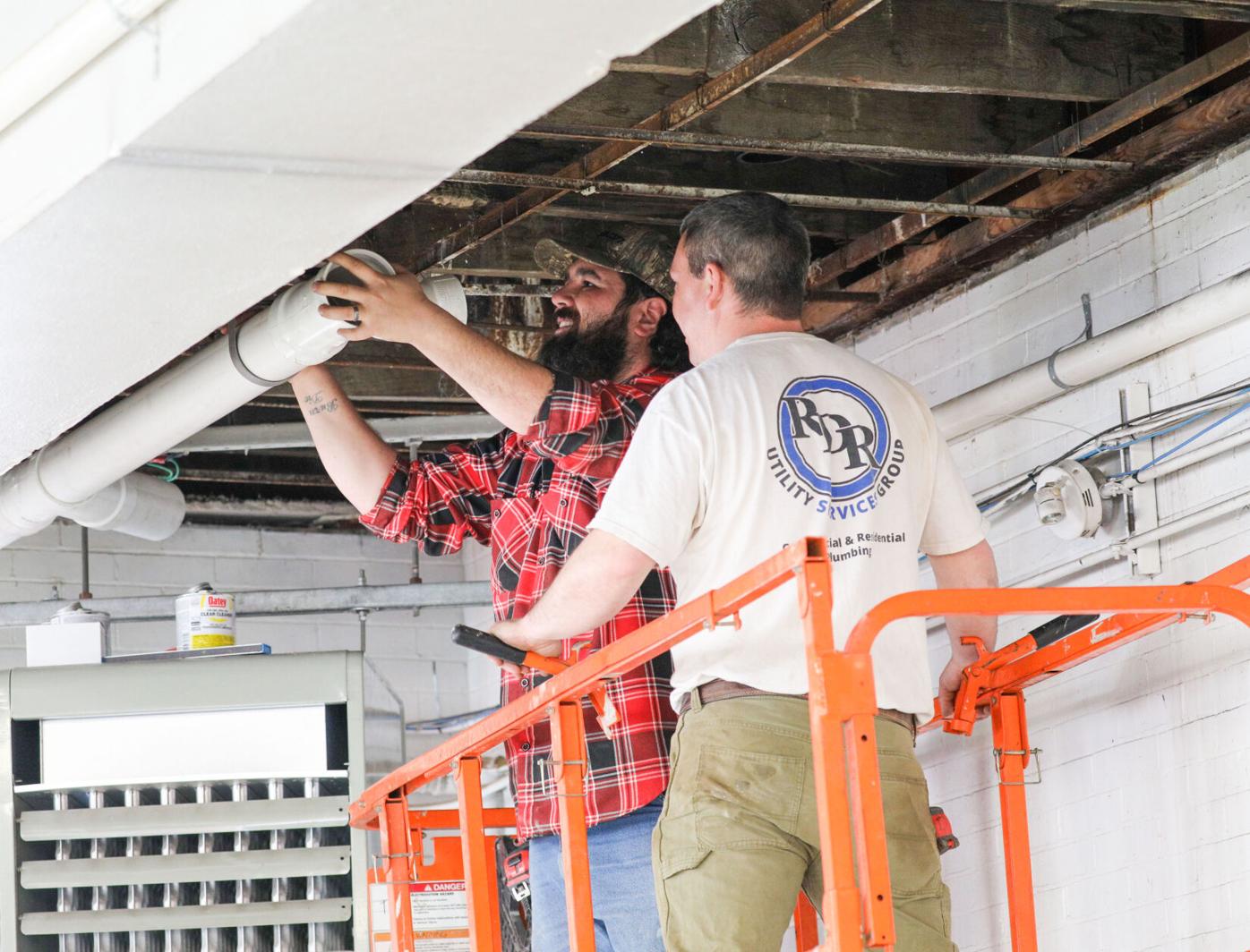 Labor donated to replace 1920s-circa pipes from Clarksburg ...