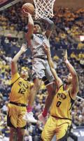 Huggins hoping Mountaineers rise to occasion against Red Raiders