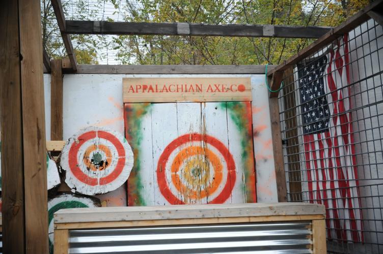 Marine Reservist John Tokarz III has turned axe throwing, woodworking