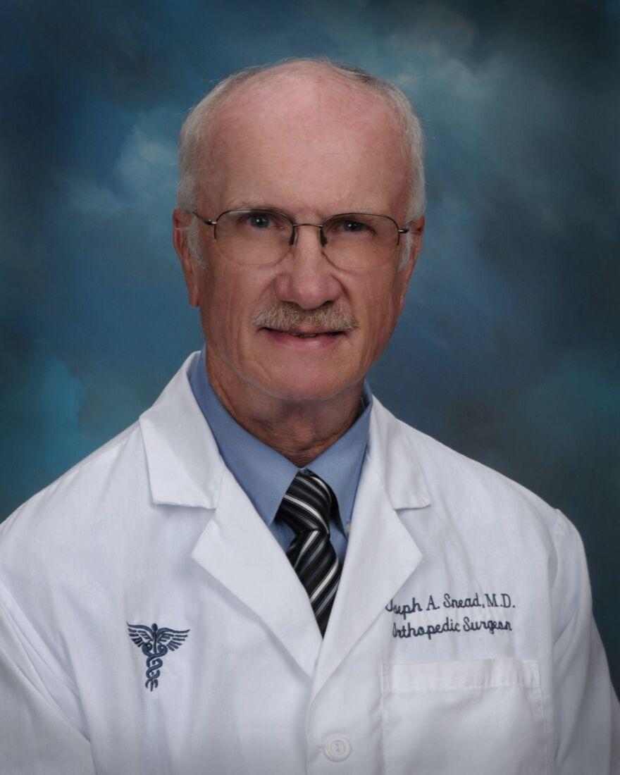 Orthopedic surgeon Dr. Joseph Snead honored at retirement reception