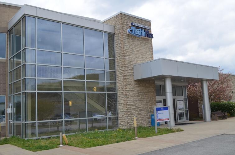 Marion Co., West Virginia, officials gather to cut ribbon for new