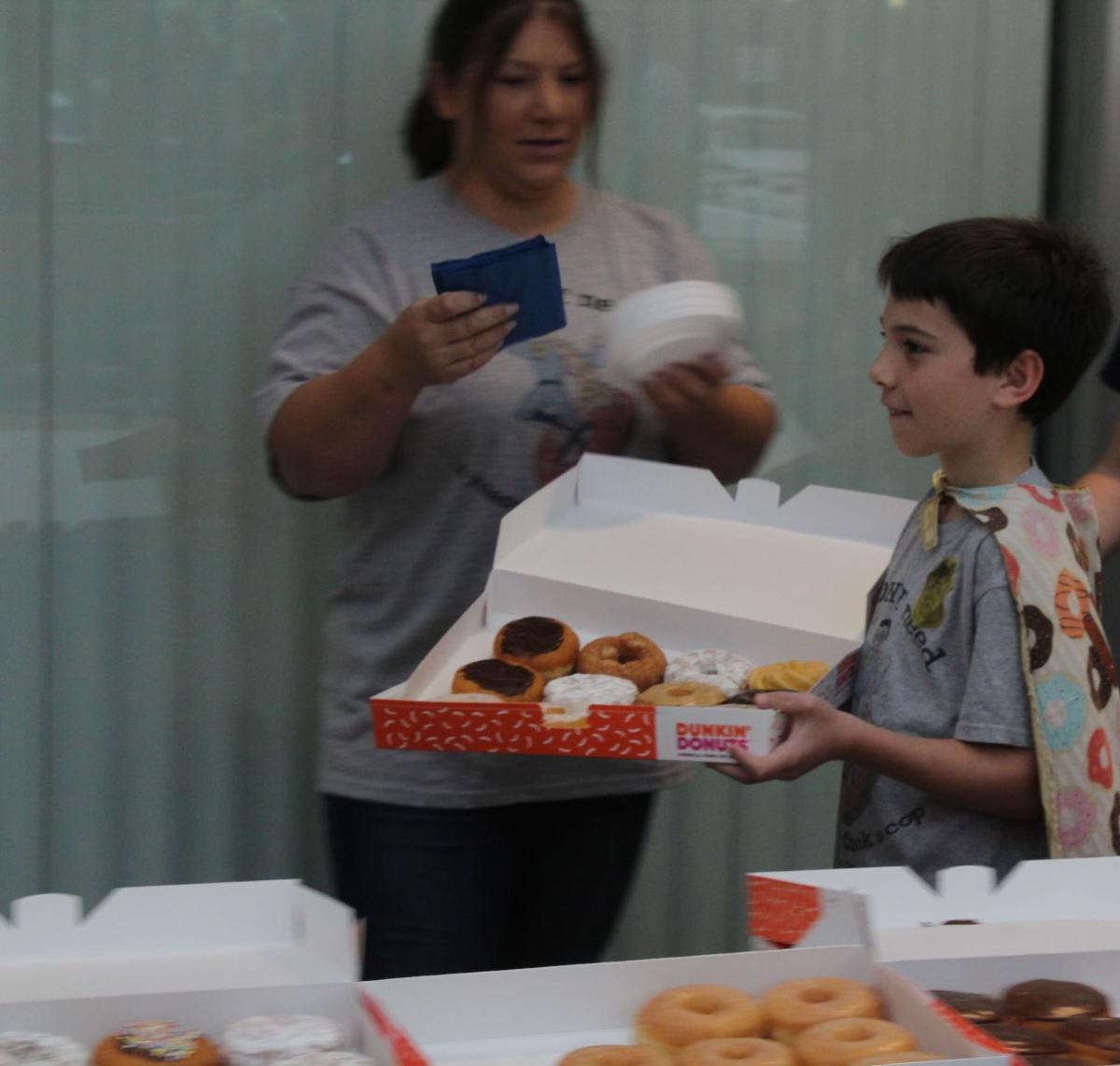 donut boy hands out