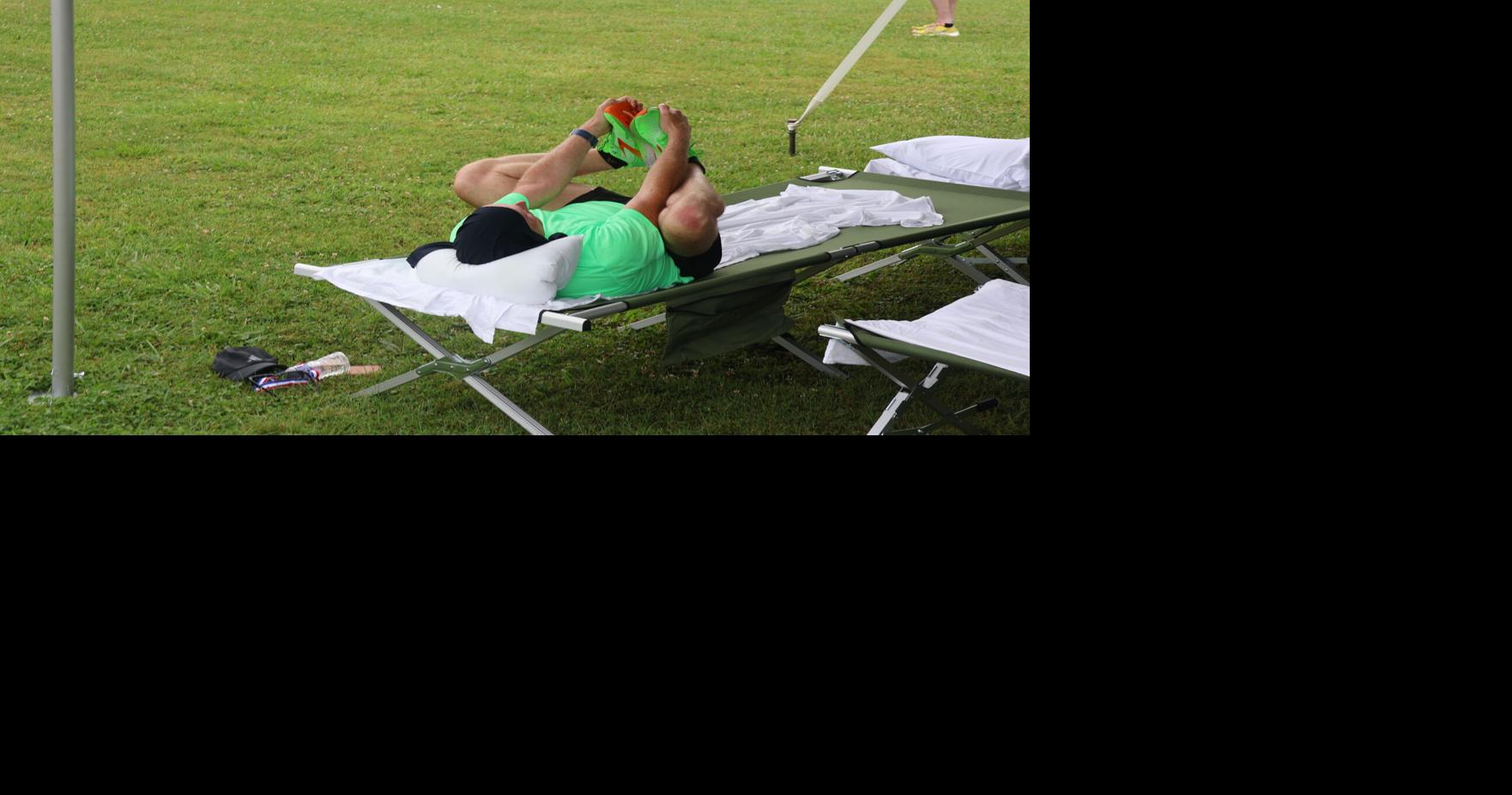 Doing stretches under the tent