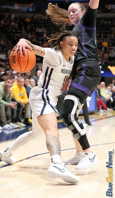 JJ Quinerly named Big 12 Defensive Player of the Year | West Virginia ...