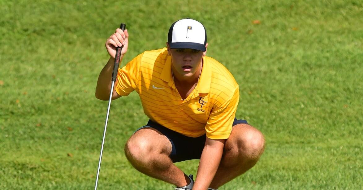 EF tucker sizing up his putt.JPG