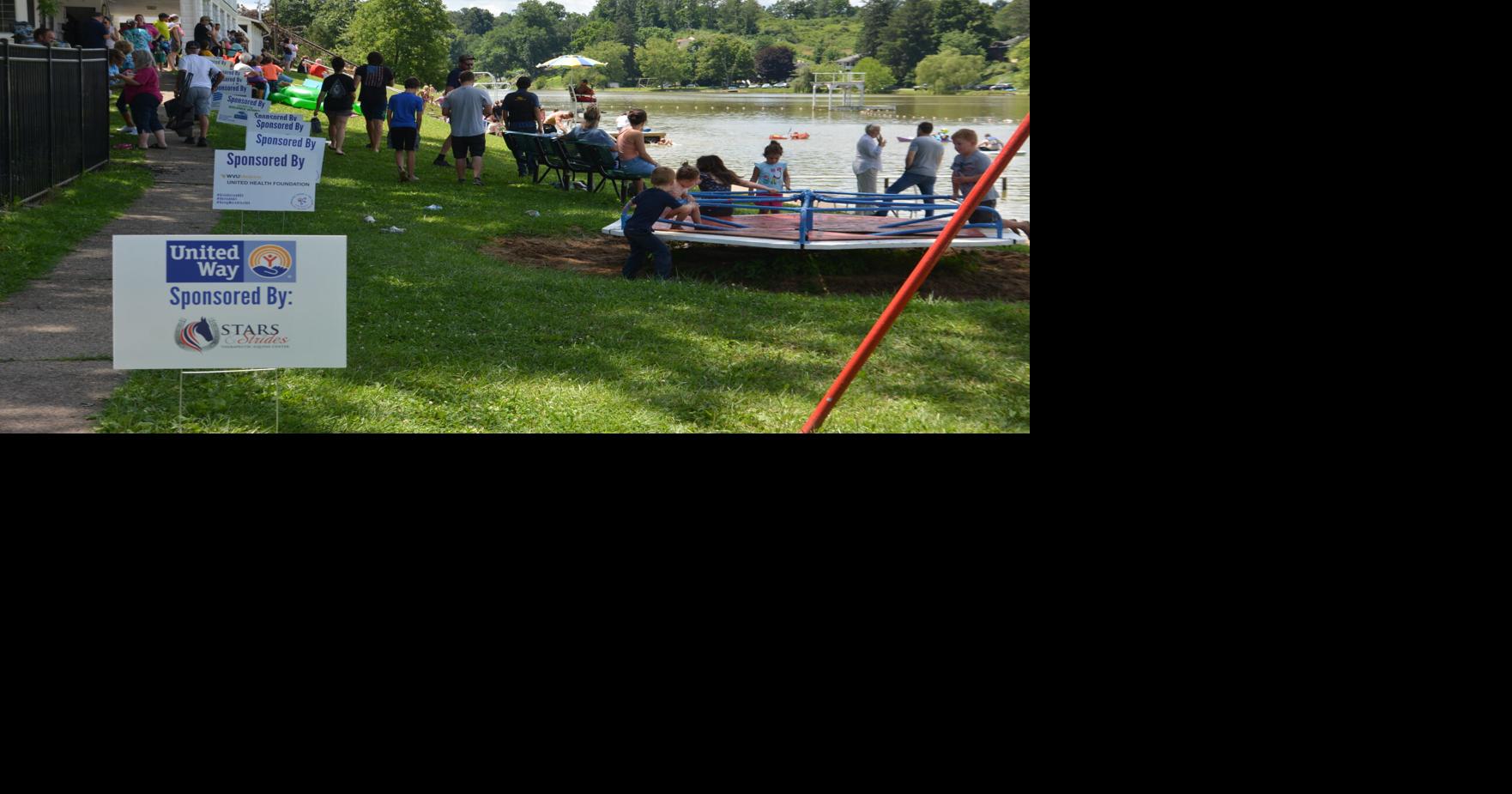 Individuals kayak, paddleboard in Bridgeport's (West Virginia) Maple