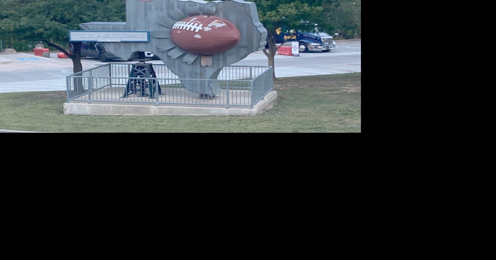 WVU FB 1024 Amon G; Carter statue front