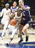 Smith's career game lifts WVU over Delaware State