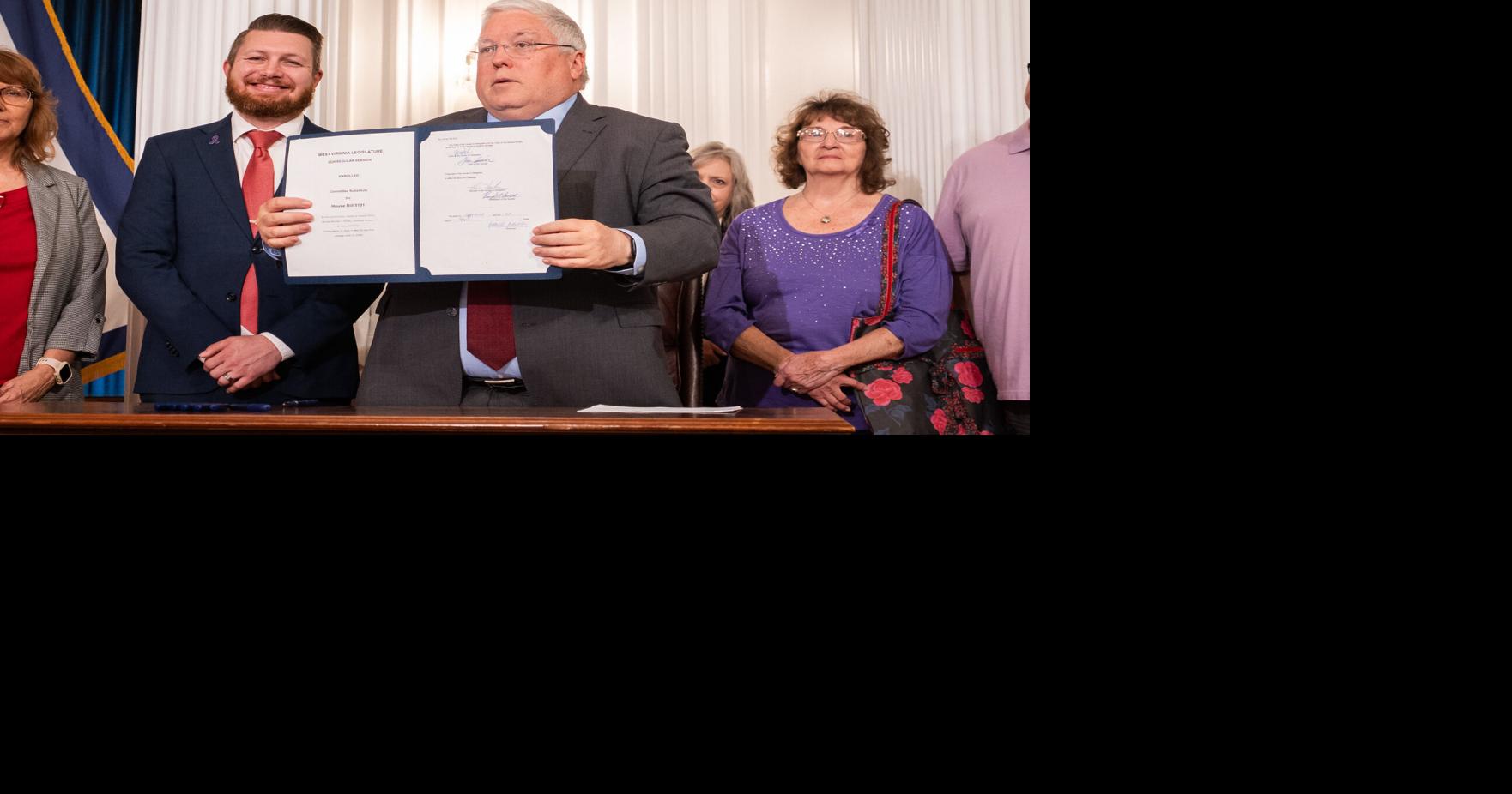 Governor holds ceremonial bill signing for Domestic Violence Prevention Act