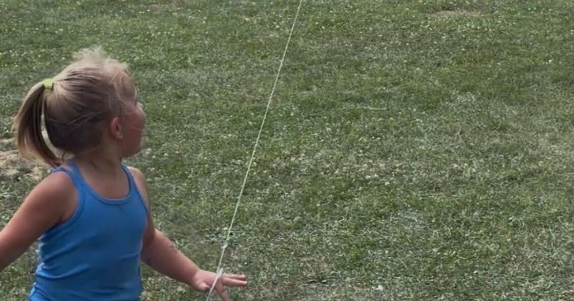 Eating ice cream and flying a kite