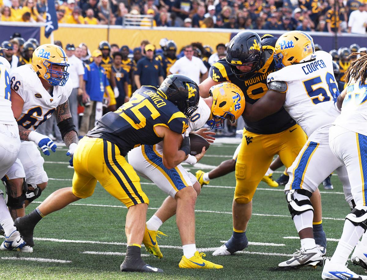 WVU football 0913 Reid Carrico sack front West Virginia University