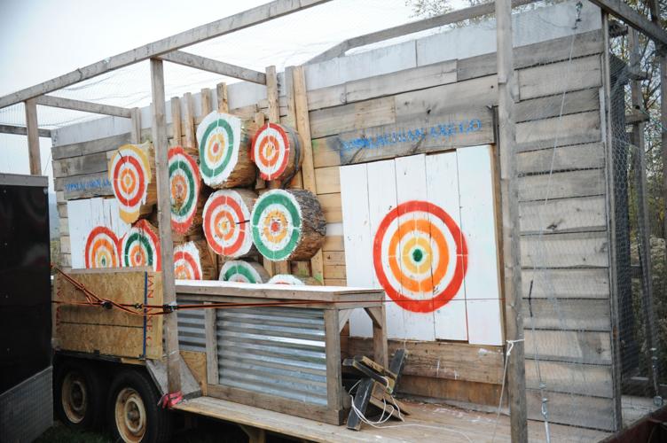 Marine Reservist John Tokarz III has turned axe throwing, woodworking