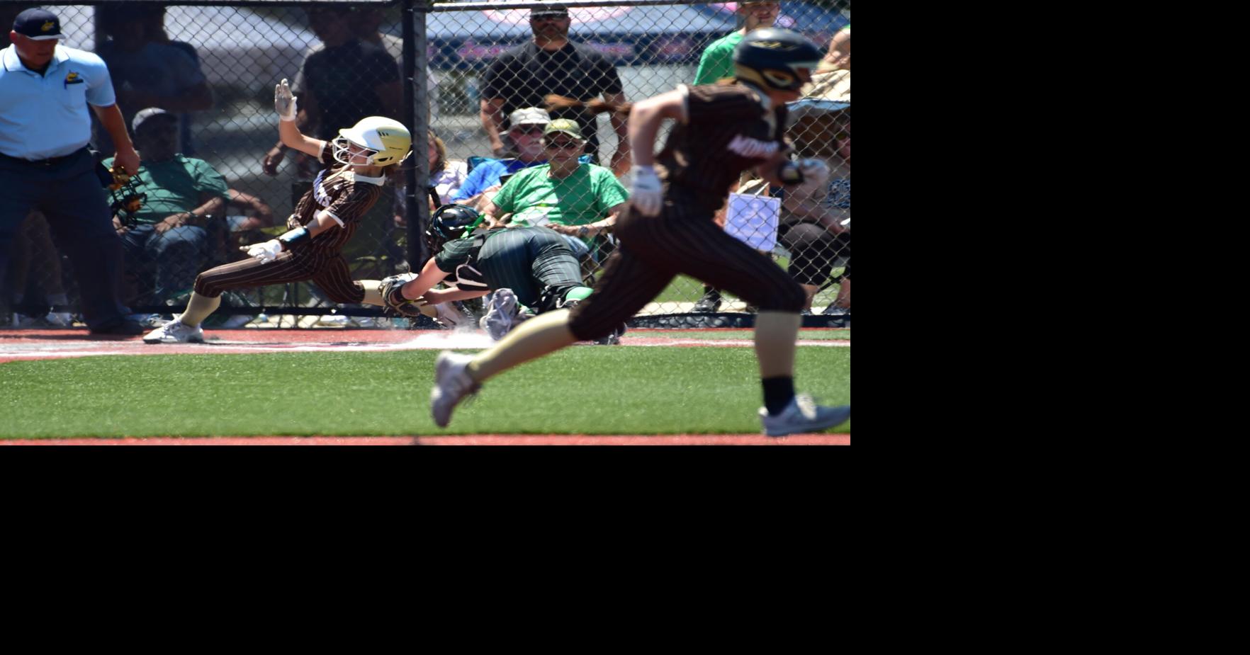 Kaylee White tagged out at the plate.JPG