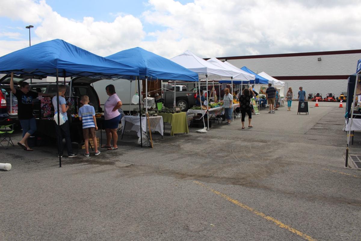 Visitors to the Clarksburg Farmers Market support community News