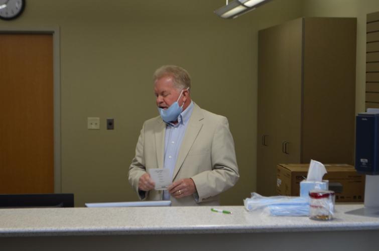 Marion Co., West Virginia, officials gather to cut ribbon for new