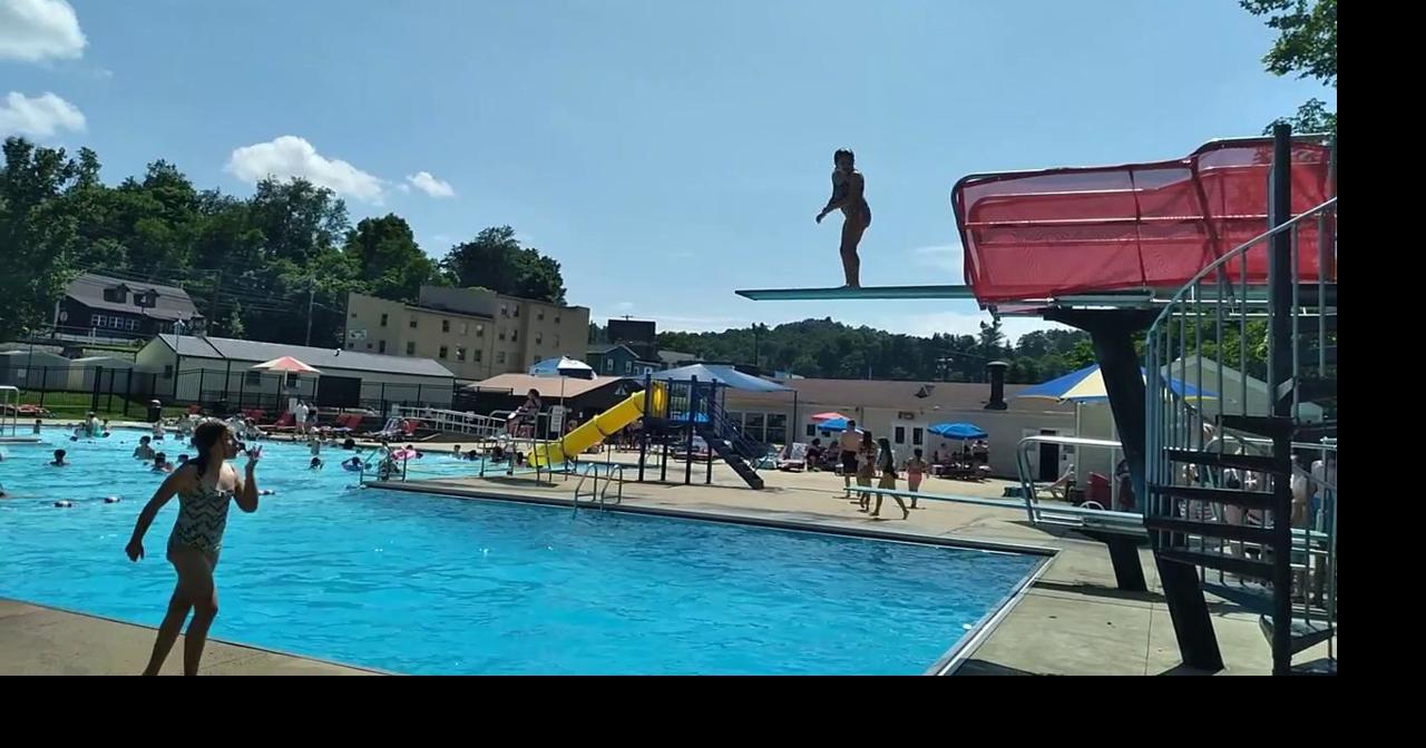 Children dive in to Bridgeport (West Virginia) City Pool to cool off