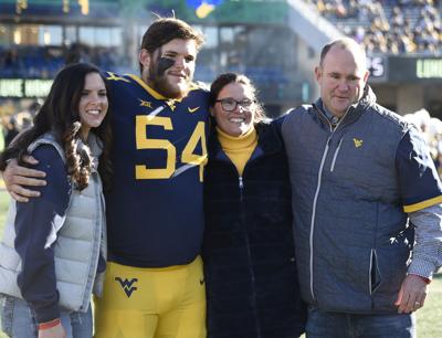 WVU football 1119 Zach Frazier with family front