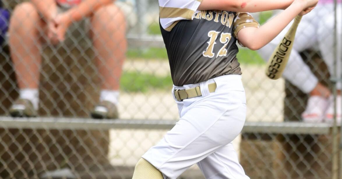 Chase Fisher with a big cut at the plate for Shinnston.JPG