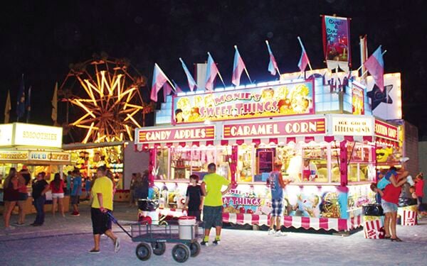 Fun in the barns and on the midway at the Marion County Fair