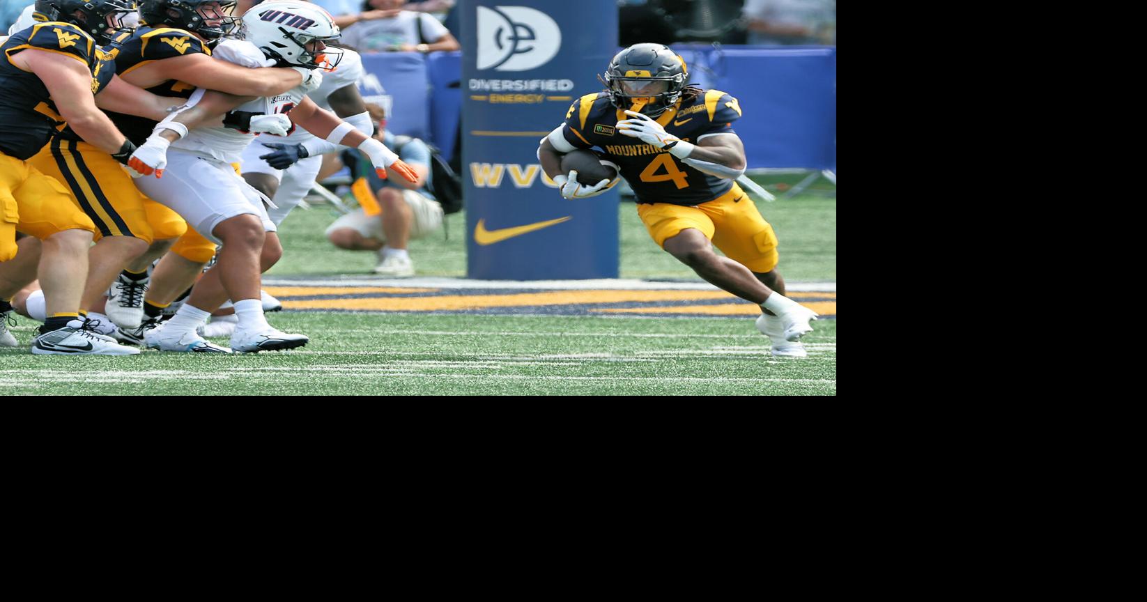 Lavishing praise upon Michael Hawkins Jr., Cam Cook after WVU's blowout victory