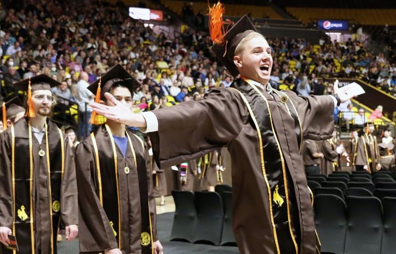 Cowboy strong UW students, families tout resilience on graduation day