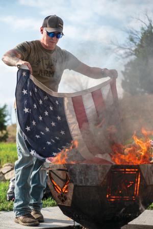 Lessons in flag etiquette: Douglas Legion members say farewell to flags