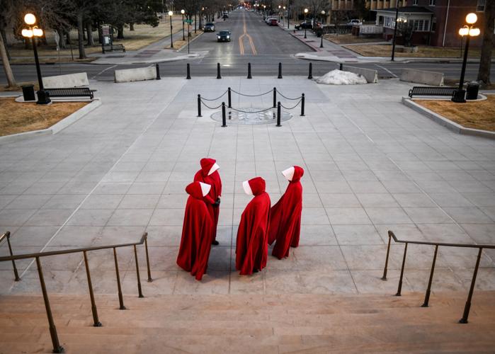 'Handmaid's Protest' draws attention to bills of concern to women ...