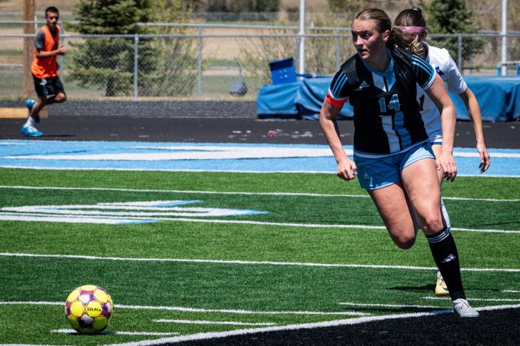 East senior Ava Walsh helping mentor younger T-Bird soccer players in ...