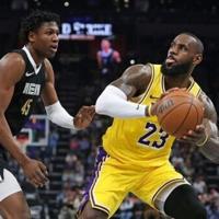 Los Angeles Lakers star LeBron James drives against GG Jackson of Memphis in the Lakers' NBA victory over the Grizzlies