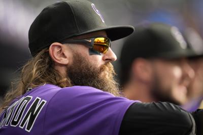 Charlie Blackmon with his wife and daughter