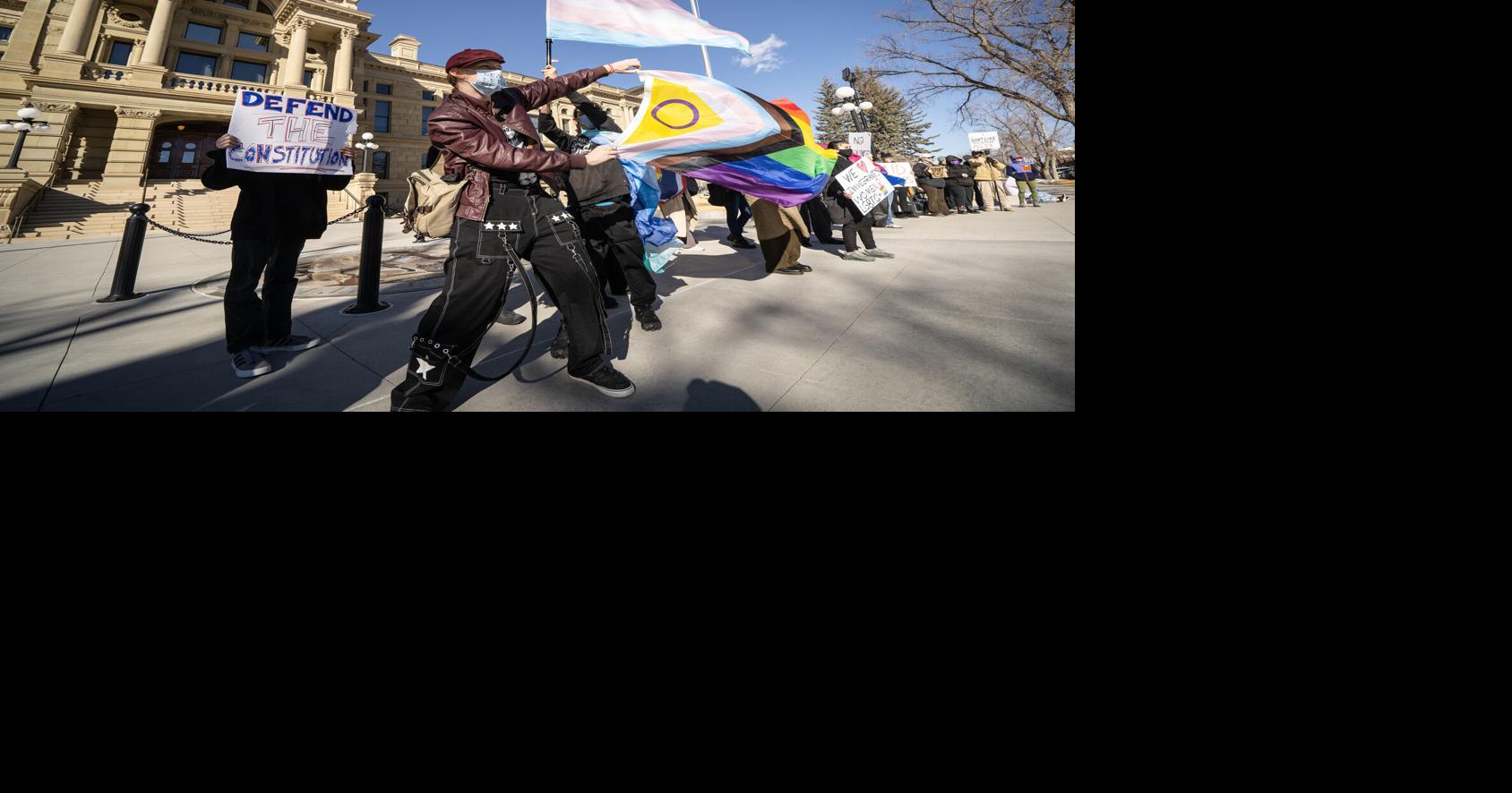 Anti-Trump protesters demonstrate outside Wyoming State Capitol ...