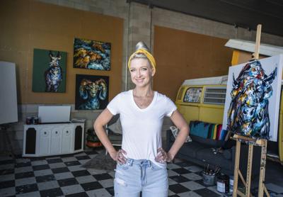 Bria Hammock poses in her studio