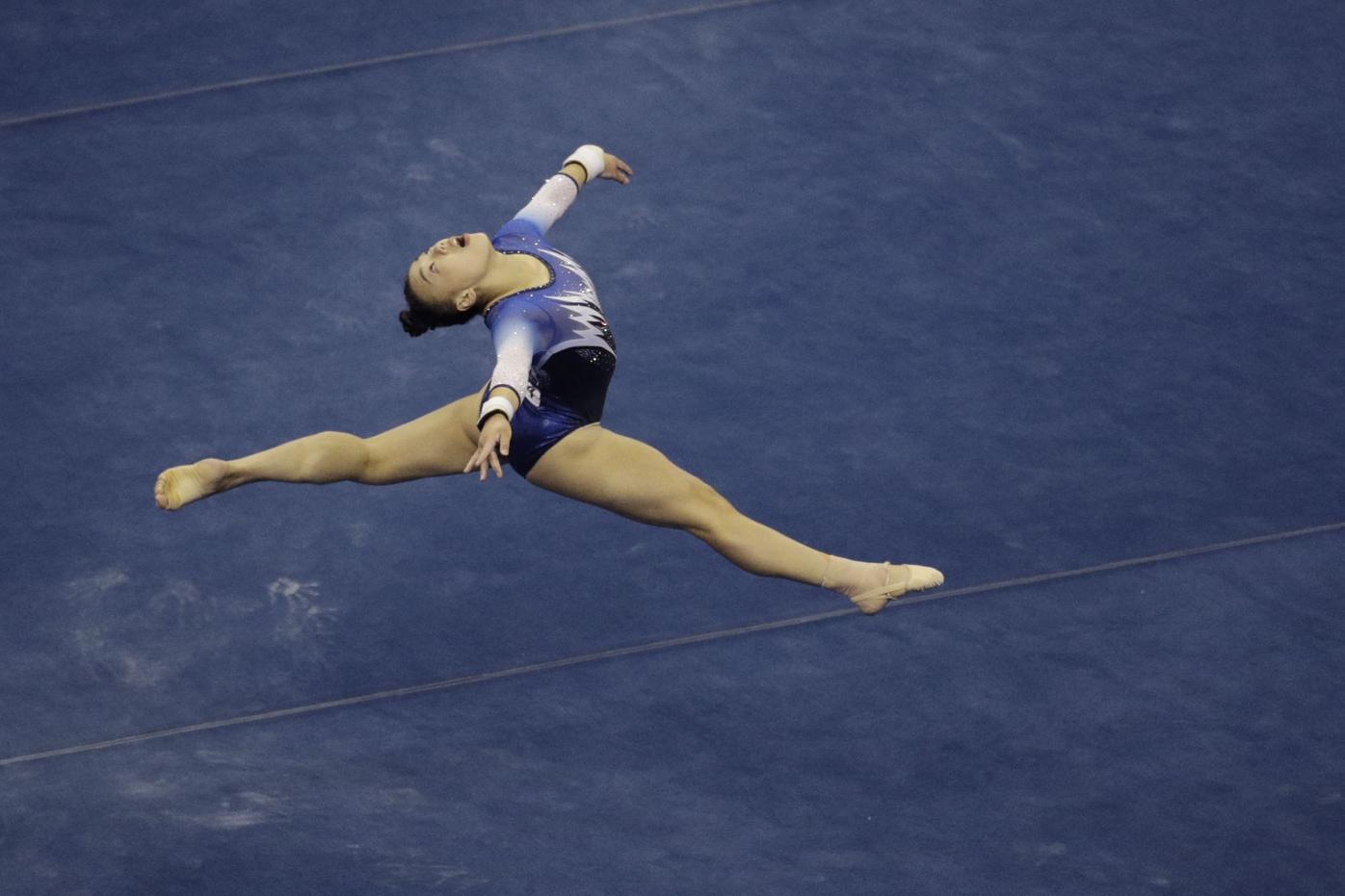 HOLD FOR MOVEMENT WITH STORY BY WILL GRAVES—Gymnastics coaches