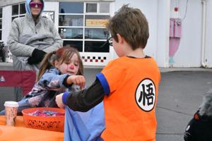 Crowds brave the chill for the annual Halloween Stroll