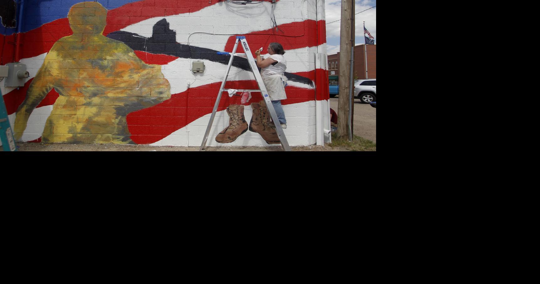 Two Cheyenne artists create downtown mural to honor military | Local ...