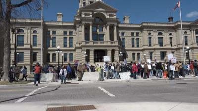 Hands OFF! Rally at Cheyenne Capitol draws in hundreds