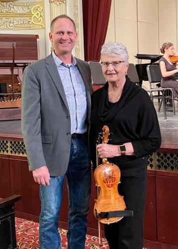 Crofton Woman Pursues Musical Passion — With Strings Attached
