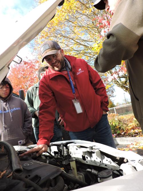15 Teacher Brandon Hoke reminding students about being careful when opening the radiator cap .JPG