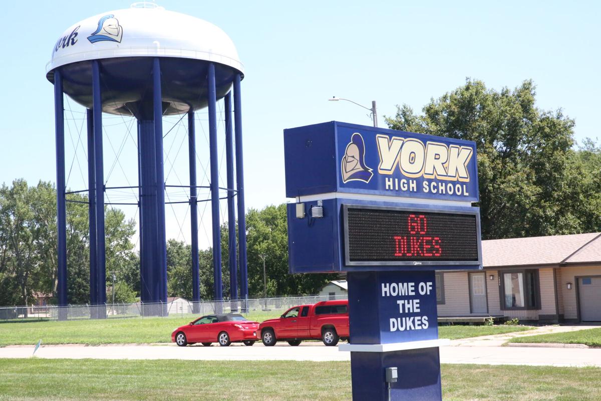 Dukes water tower, high school sign