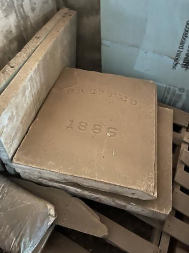 Cornerstone of historic courthouse located at roads department