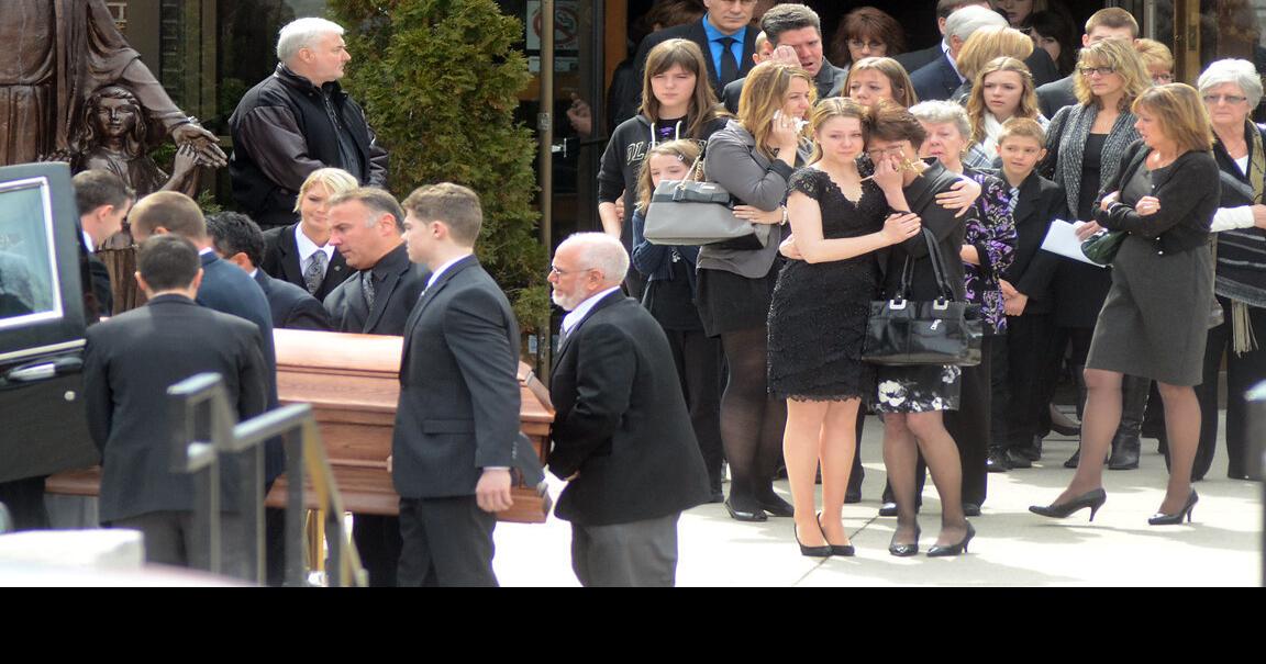 Mourners fill church for Rick Maloney's funeral