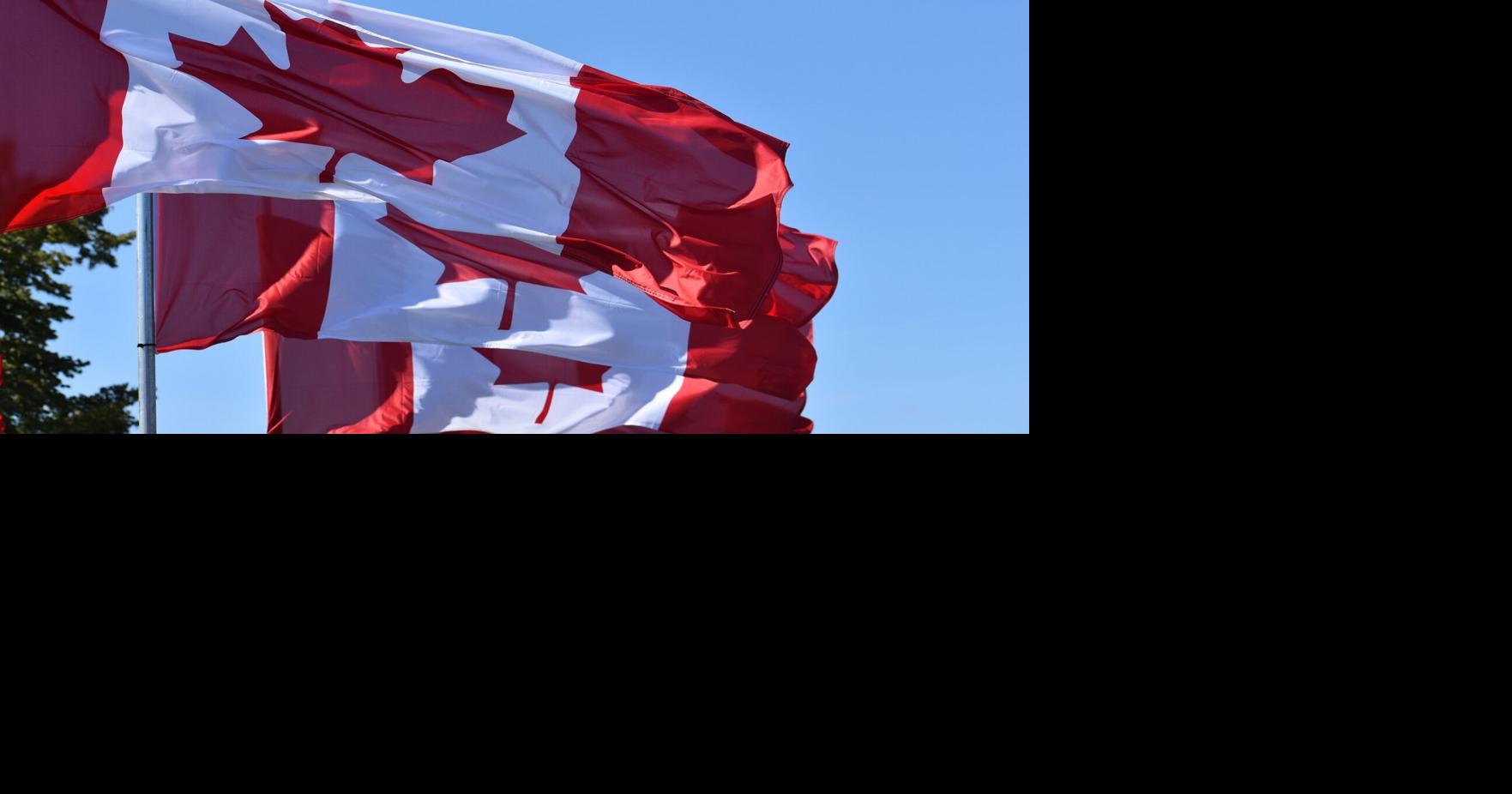 Canadian flag waving over local market products