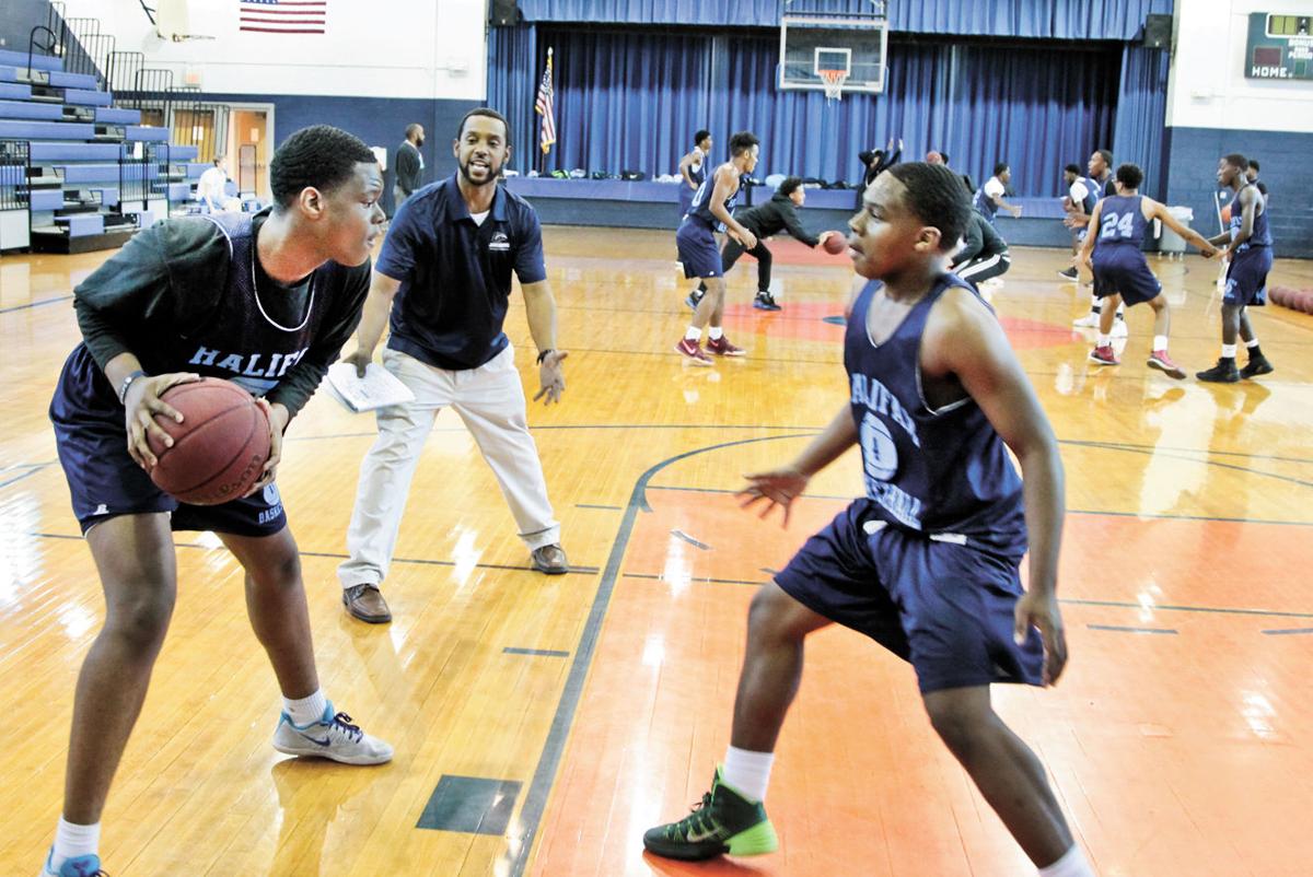 With Roster Finalized Comets Varsity Boys Cagers Hard At Work