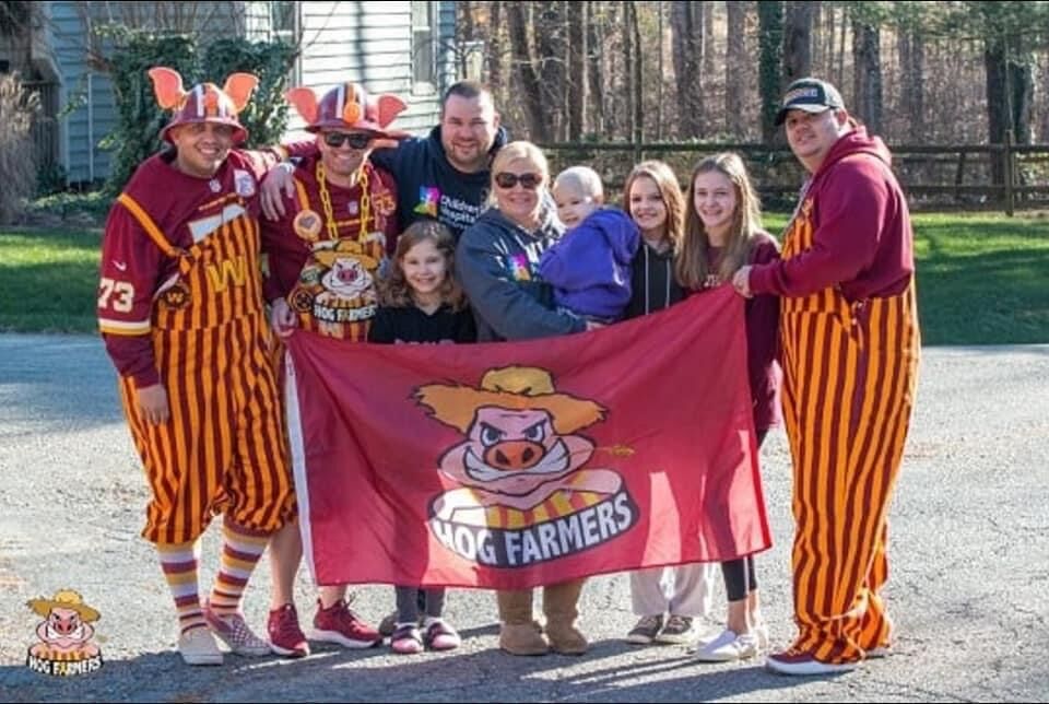 Redskins fans known as the 'Hogfarmers' help youth